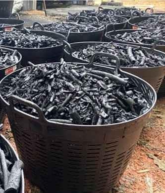 Baskets filled with finished biochar