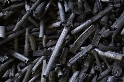 A handful of biochar produced from bamboo biomass